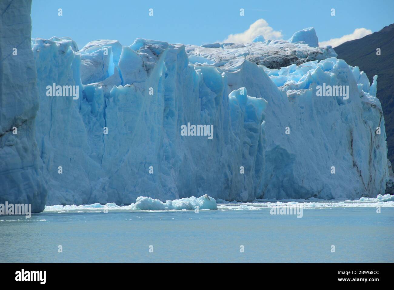 The Perito Moreno Glacier glistens in the summer sun in Patagonia in Argentina Stock Photo