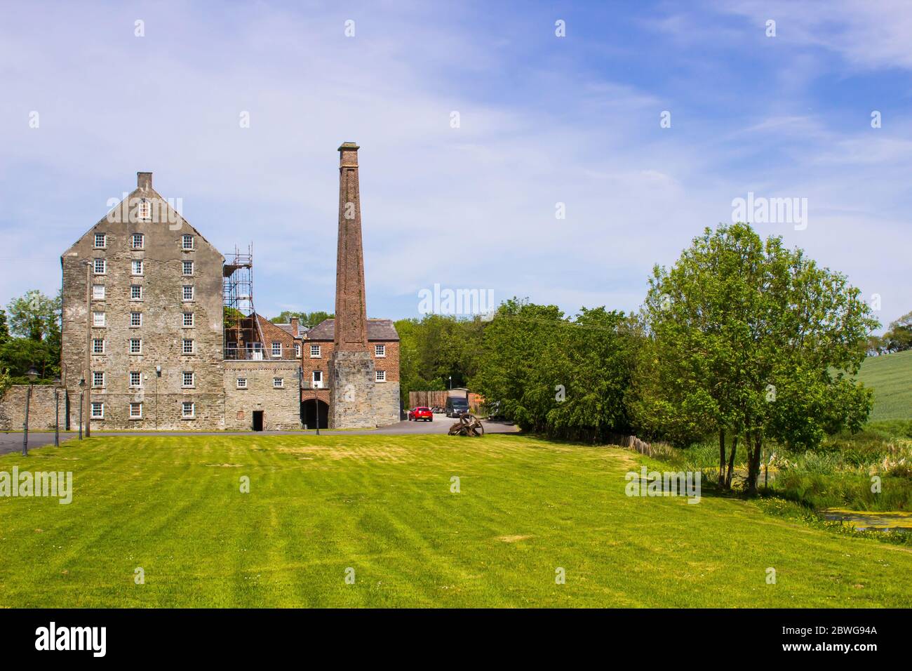 31 May 2020 The historic Ballydugan flourmill and chimney stack located near Downpatrick in County Down Northern Ireland. This restored building is no Stock Photo