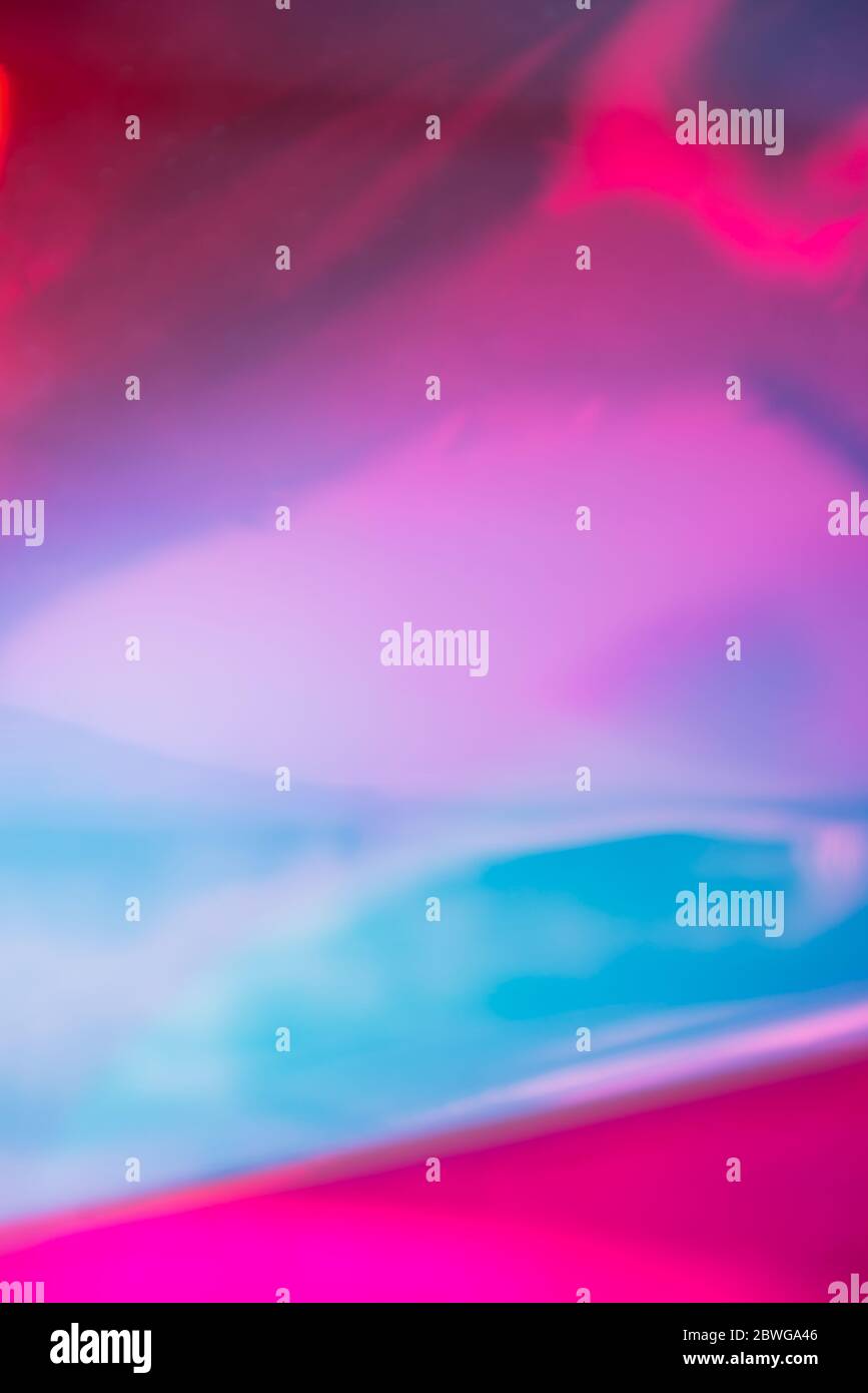 Pink Blue Color Effect Holographic effect blurred pink and blue background Stock Photo - Alamy