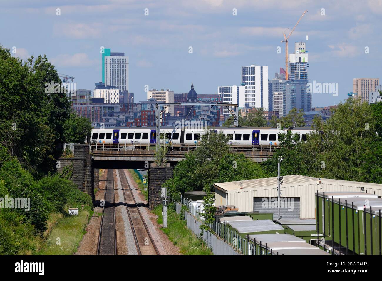 A rail class 331 train operated by Northern Rail, passes in front of ...
