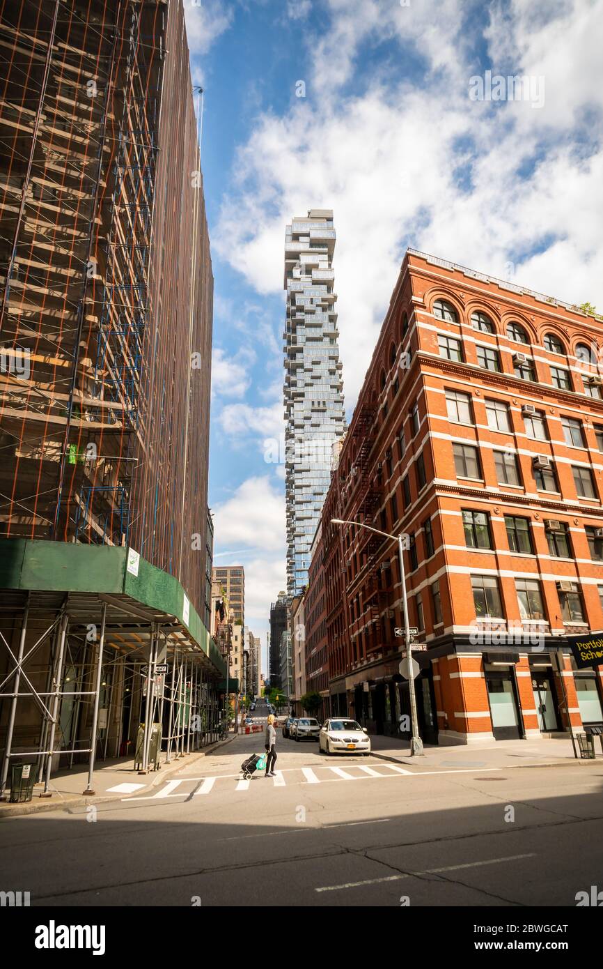 The condo skyscraper at 56 Leonard Street looms over lower Tribeca buildings in New York on Sunday, May 24, 2019. 56 Leonard Street, designed by Herzog & de Meuron is 820 feet high with 145 apartments. (© Richard B. Levine) Stock Photo