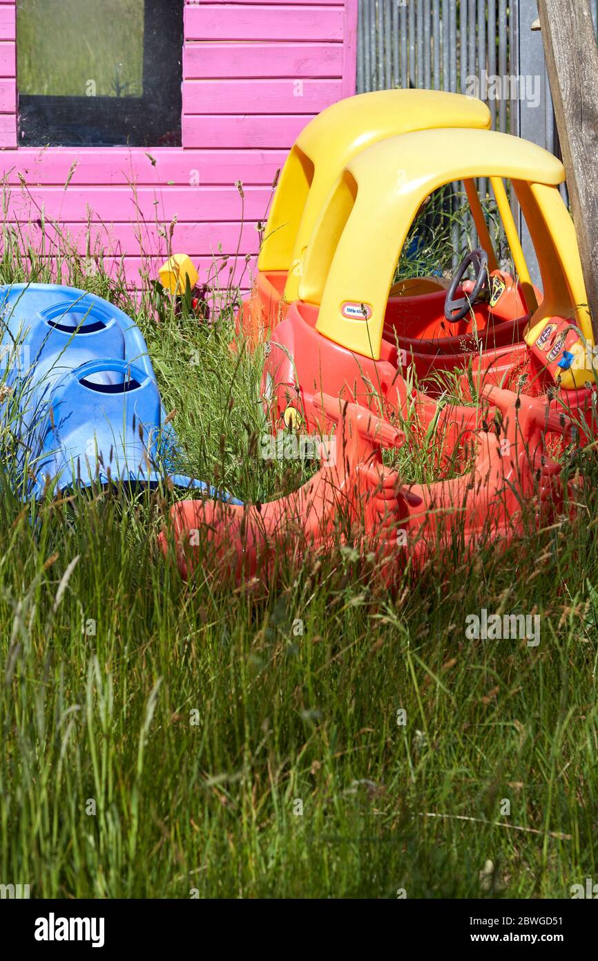 An overgrown nursery playground during coronavirus lockdown 2020 Stock Photo