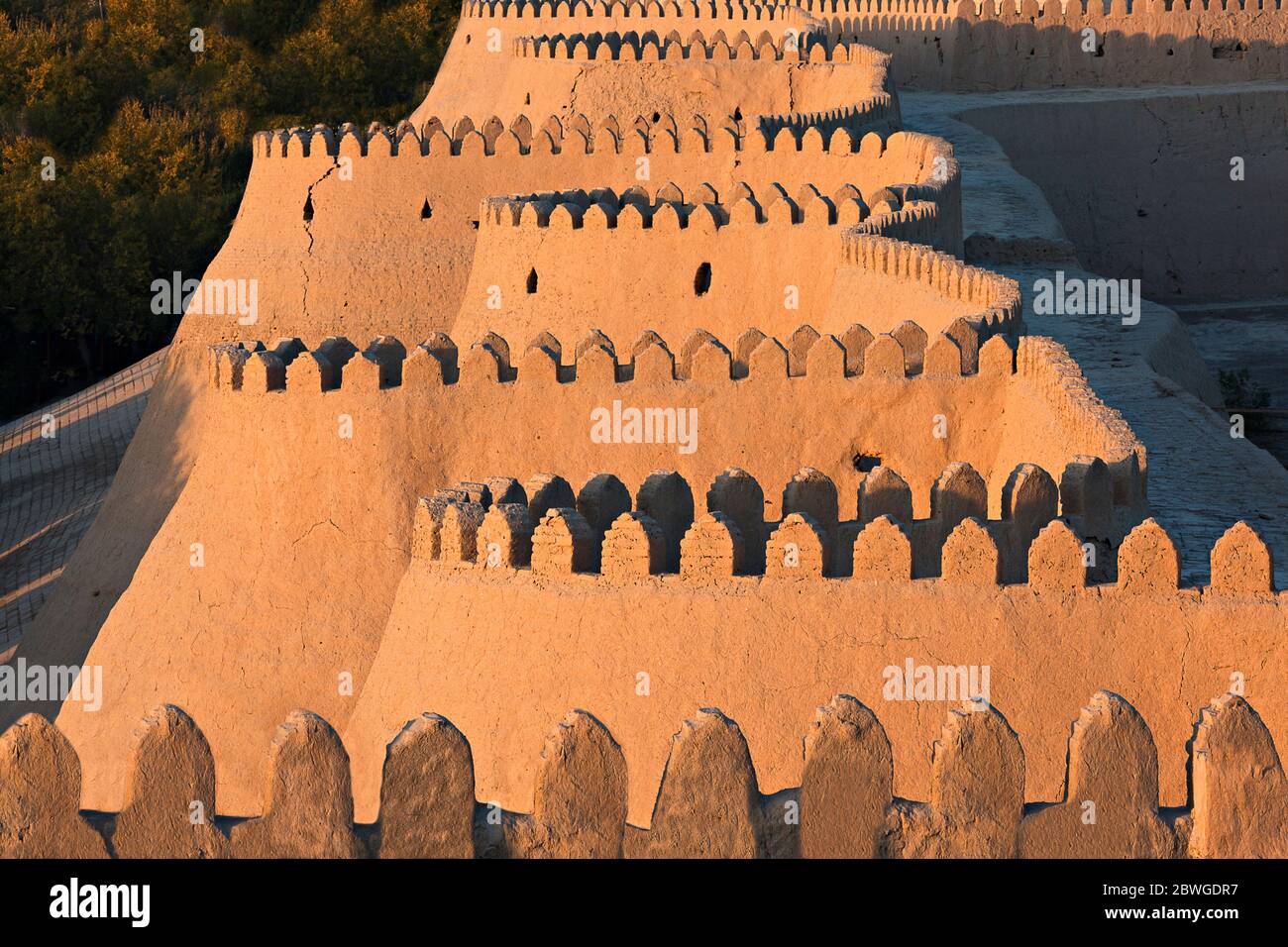 Ancient walls of the city of Khiva at the sunset, Uzbekistan Stock Photo