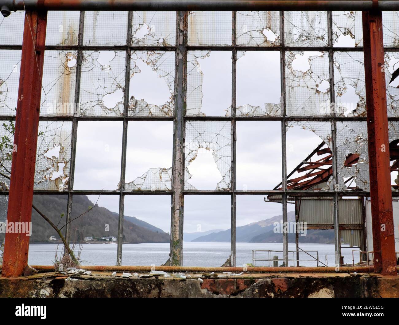 Looking out of a  window at the old Royal Naval Torpedo Testing Station and Range Arrochar  Argyll & Bute Scotland UK Stock Photo