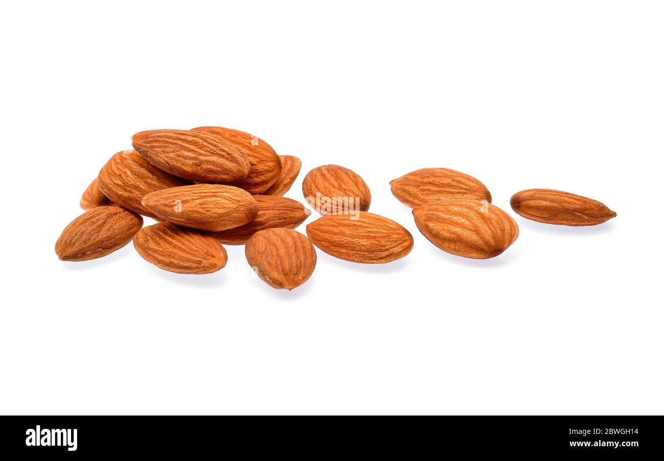Almonds isolated on white background Stock Photo - Alamy