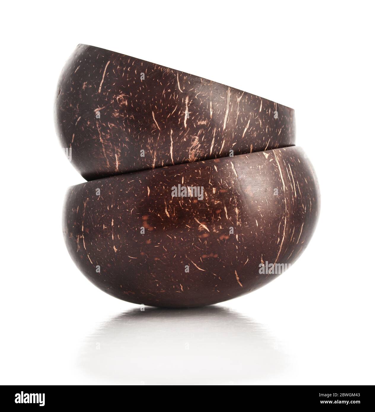 Bowls made from coconut shell isolated on white background Stock Photo