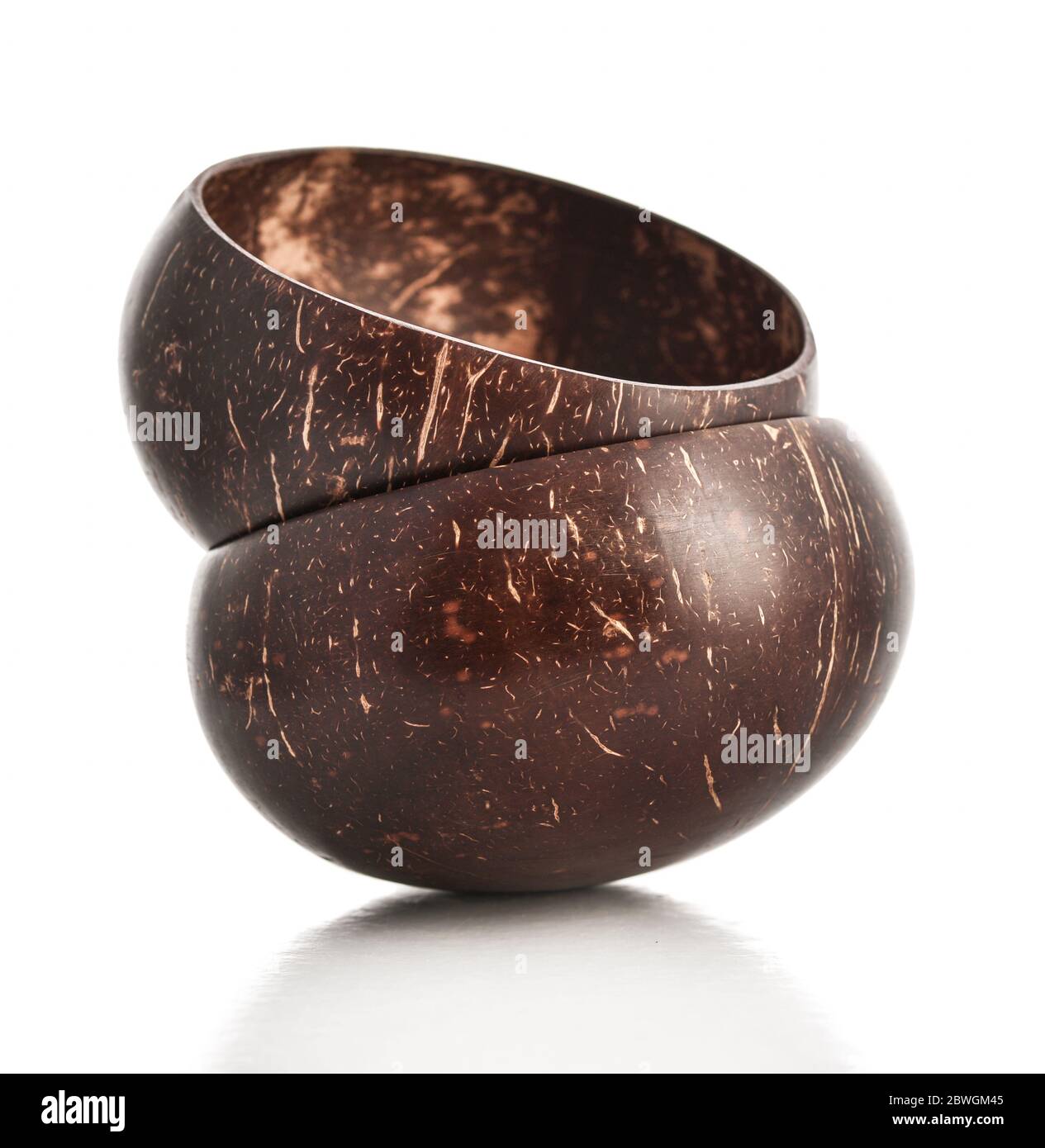 Bowls made from coconut shell isolated on white background Stock Photo