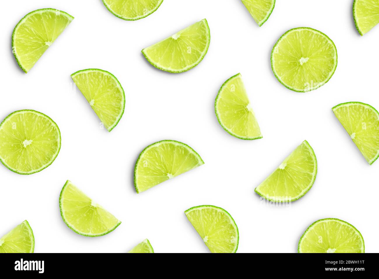 Lime slices as pattern isolated on white background Stock Photo