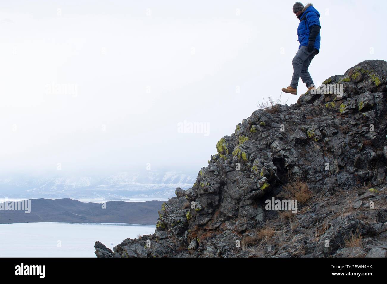Man standing on top of mountain hi-res stock photography and images - Alamy
