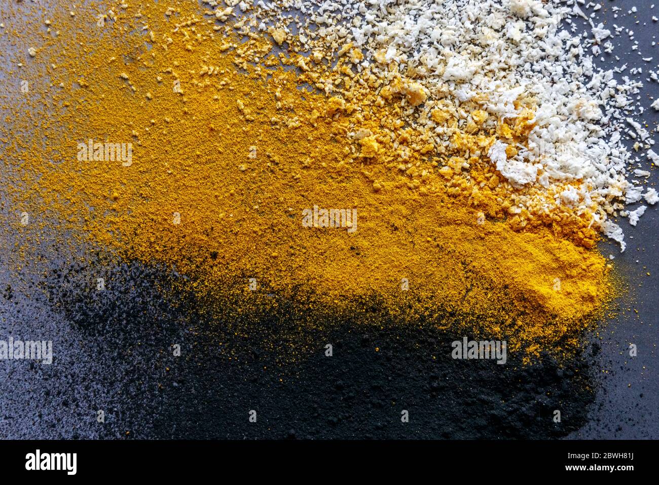 Three color explosion of black orange and white activated carbon