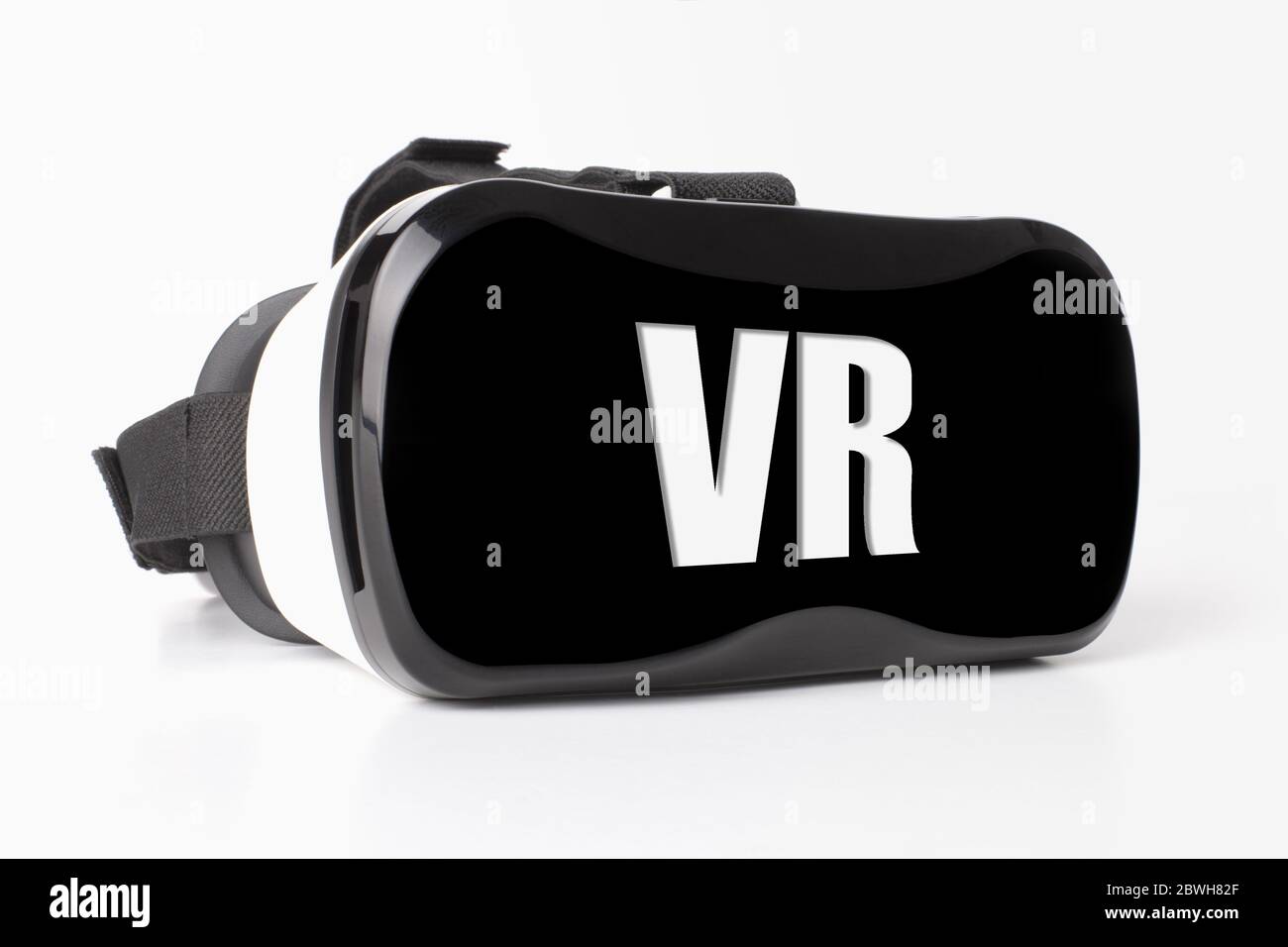 virtual reality glasses with inscription VR over gray background Stock Photo