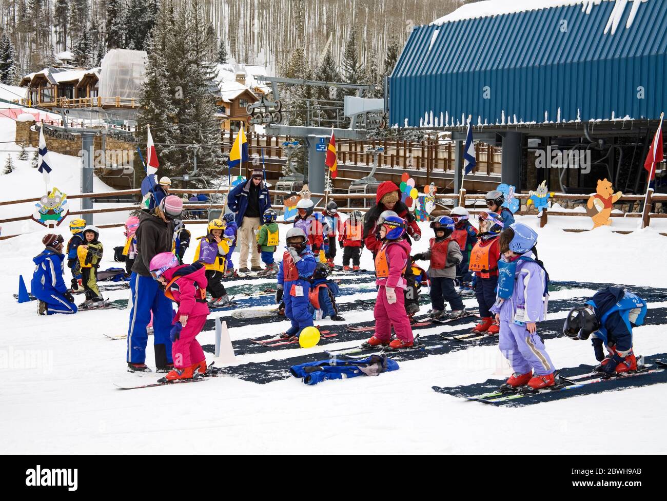 Children learning to ski at Lionshead Village, Vail Ski Resort, Rocky Mountains, Colorado, USA Stock Photo