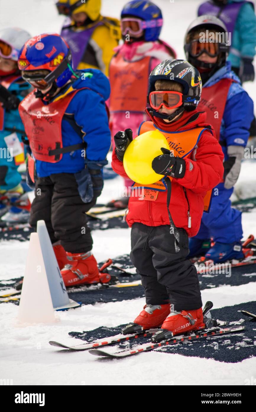 Children learning to ski at LionsHead Village, Vail Ski Resort, Rocky Mountains, Colorado, USA Stock Photo