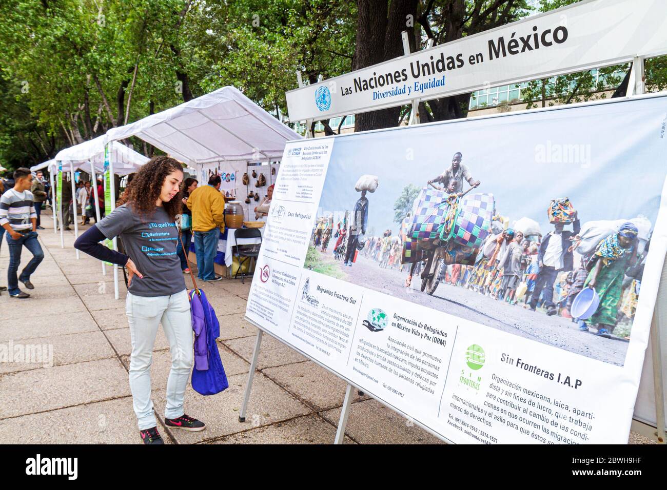 Mexico City,México Mexican,Paseo de la Reforma,Cicloton,urban bicycling program,community United Nationss,display sale,refugee exhibit,poster,Spanish, Stock Photo