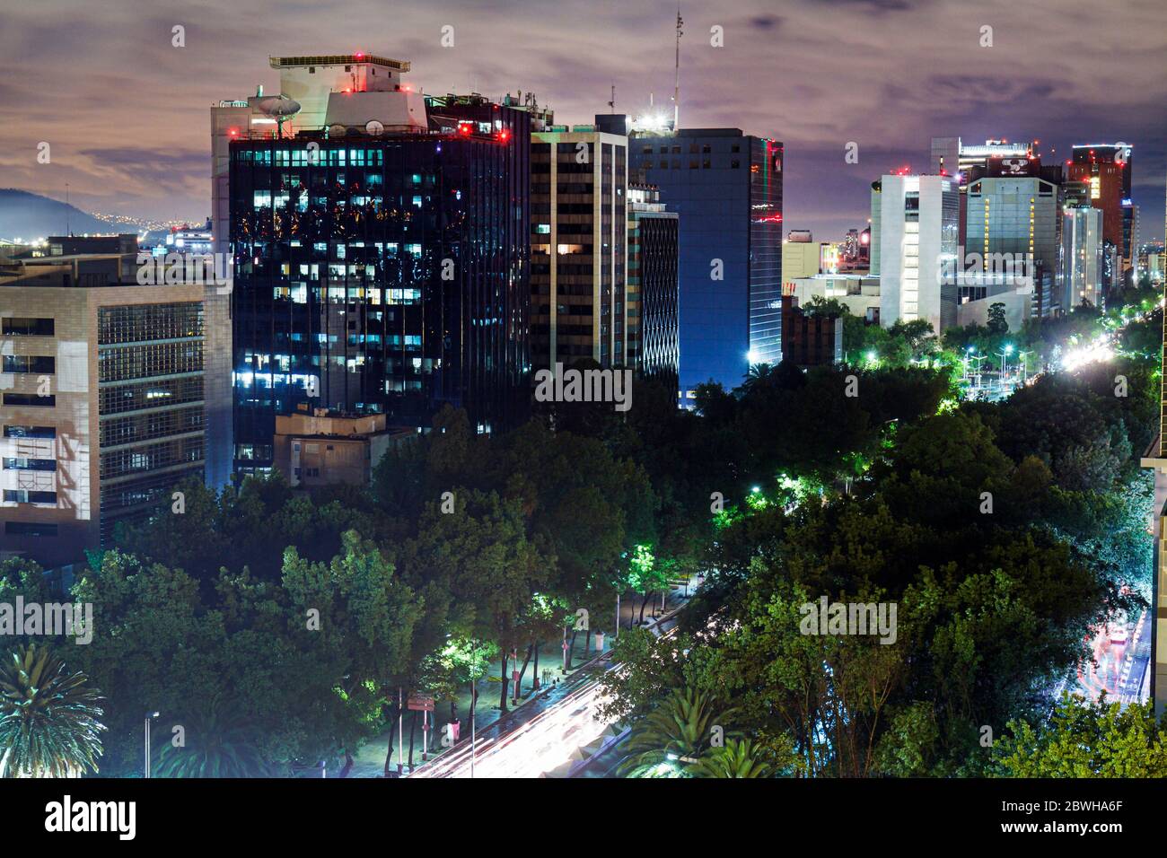 Mexico City,México Mexican,Cuauhtemoc,Paseo de la Reforma,city skyline,night,lights,avenue,trees,looking,Mex120617207 Stock Photo