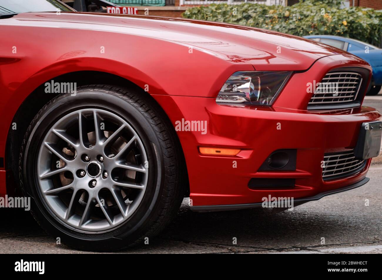 Car Front Rodes Front part of the exterior of red modern sports car with front fender ...