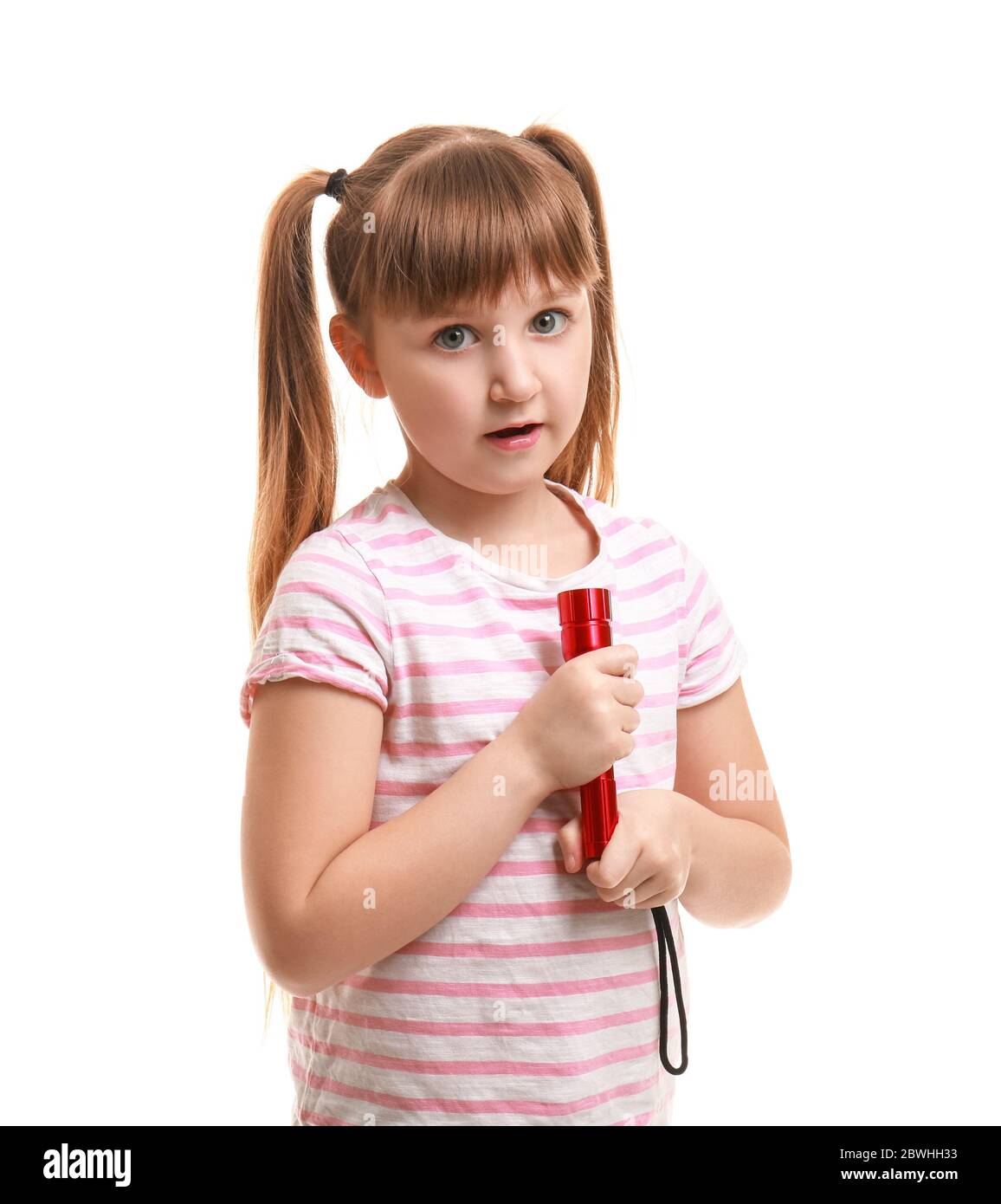 Little girl with flashlight on white background Stock Photo - Alamy