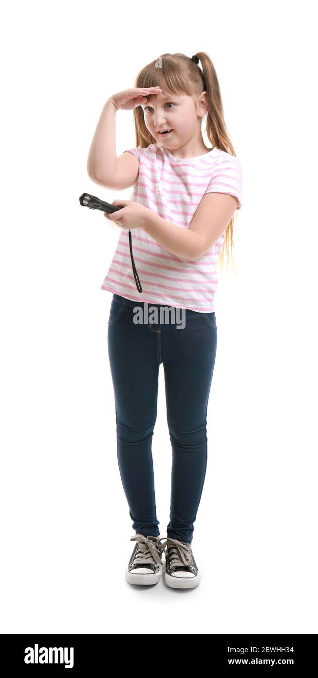 Little girl with flashlight on white background Stock Photo - Alamy