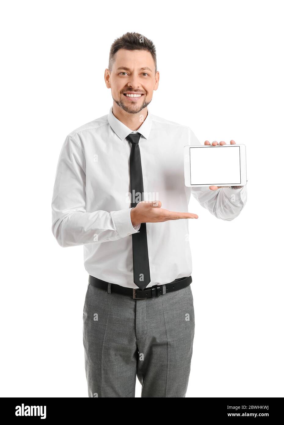 Handsome businessman with tablet computer on white background Stock Photo