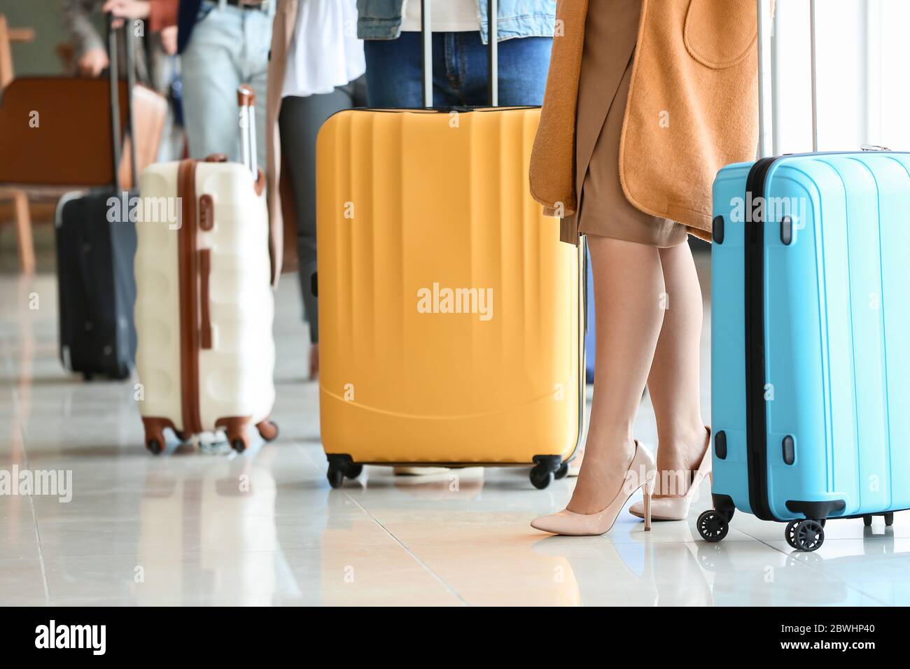 People waiting in line at the airport Stock Photo