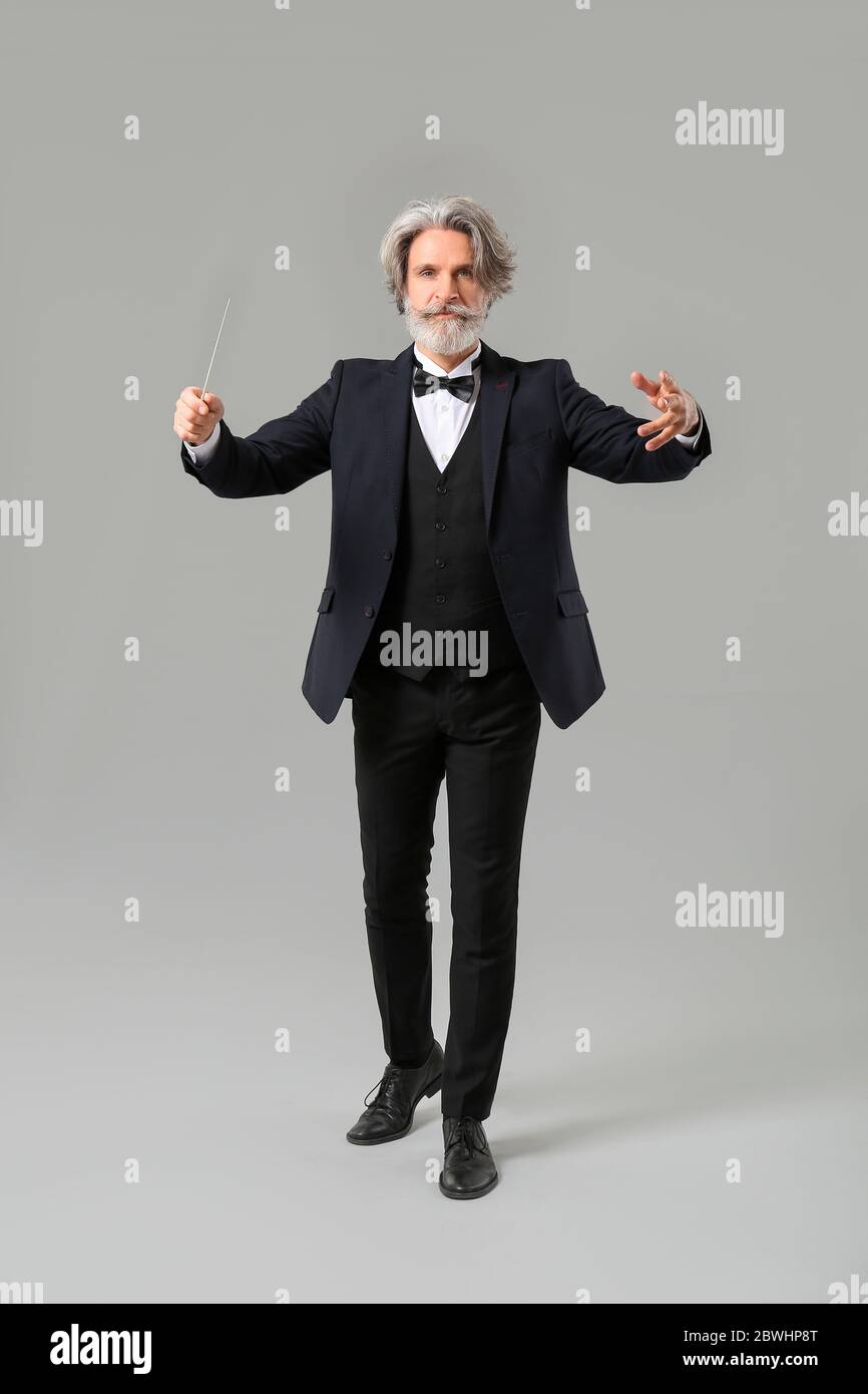 Male conductor hi-res stock photography and images - Alamy