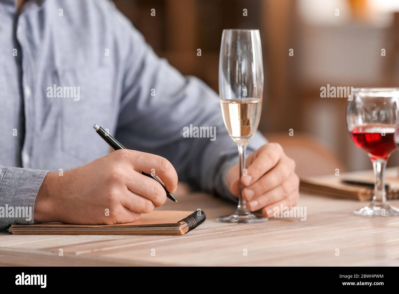 Man tasting wine at the restaurant Stock Photo - Alamy