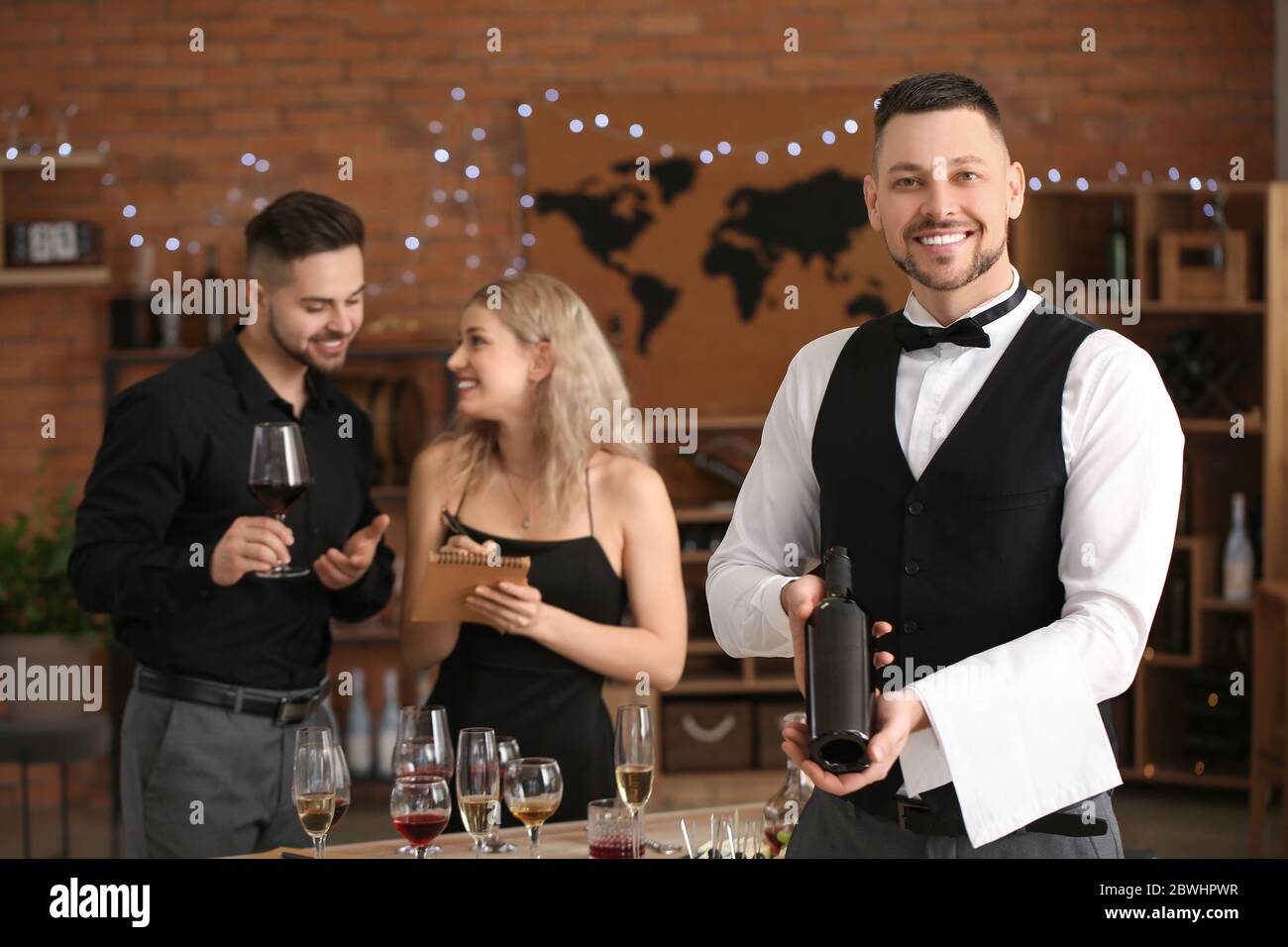 People tasting wine at the restaurant Stock Photo - Alamy