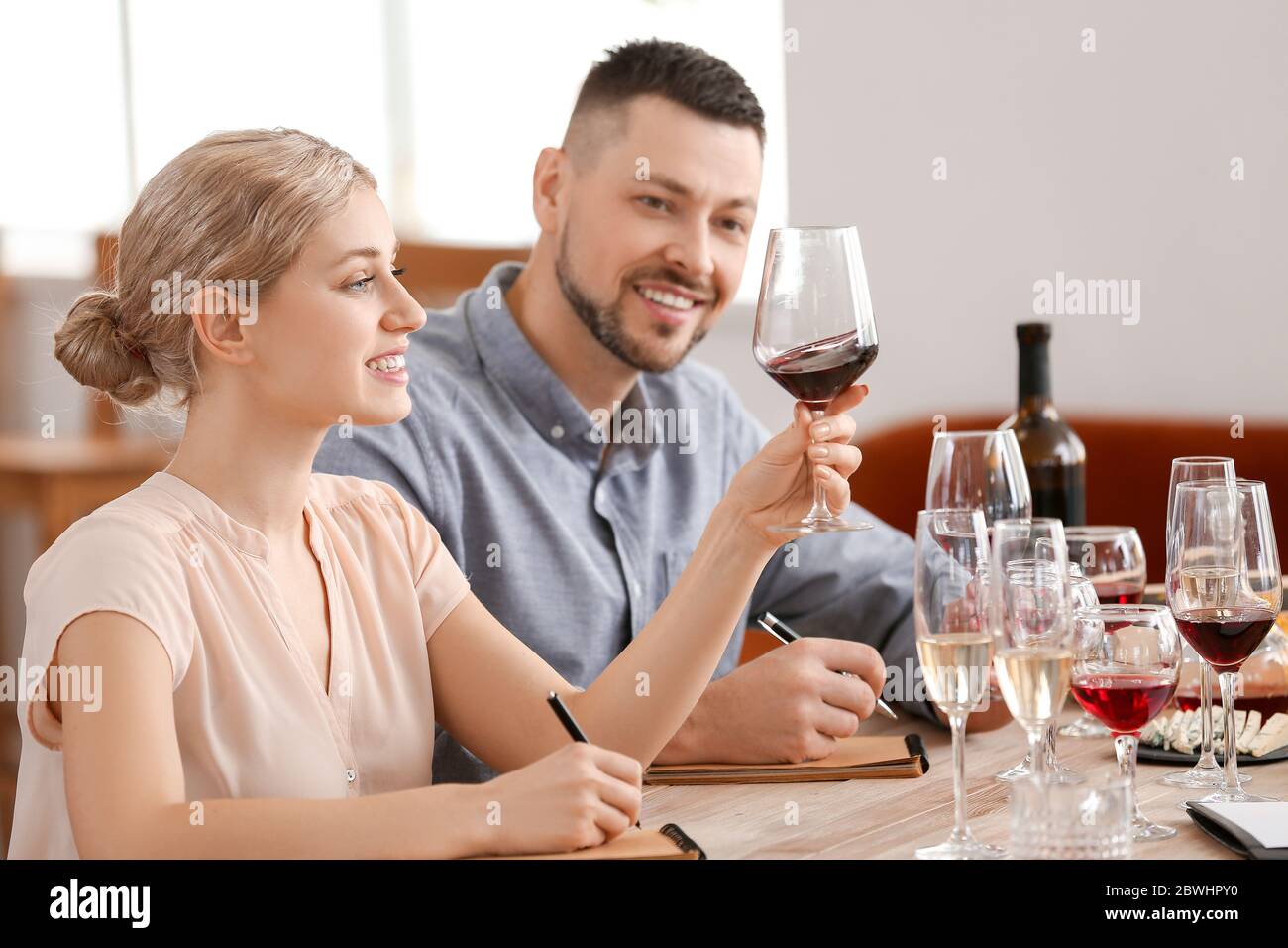 People tasting wine at the restaurant Stock Photo - Alamy
