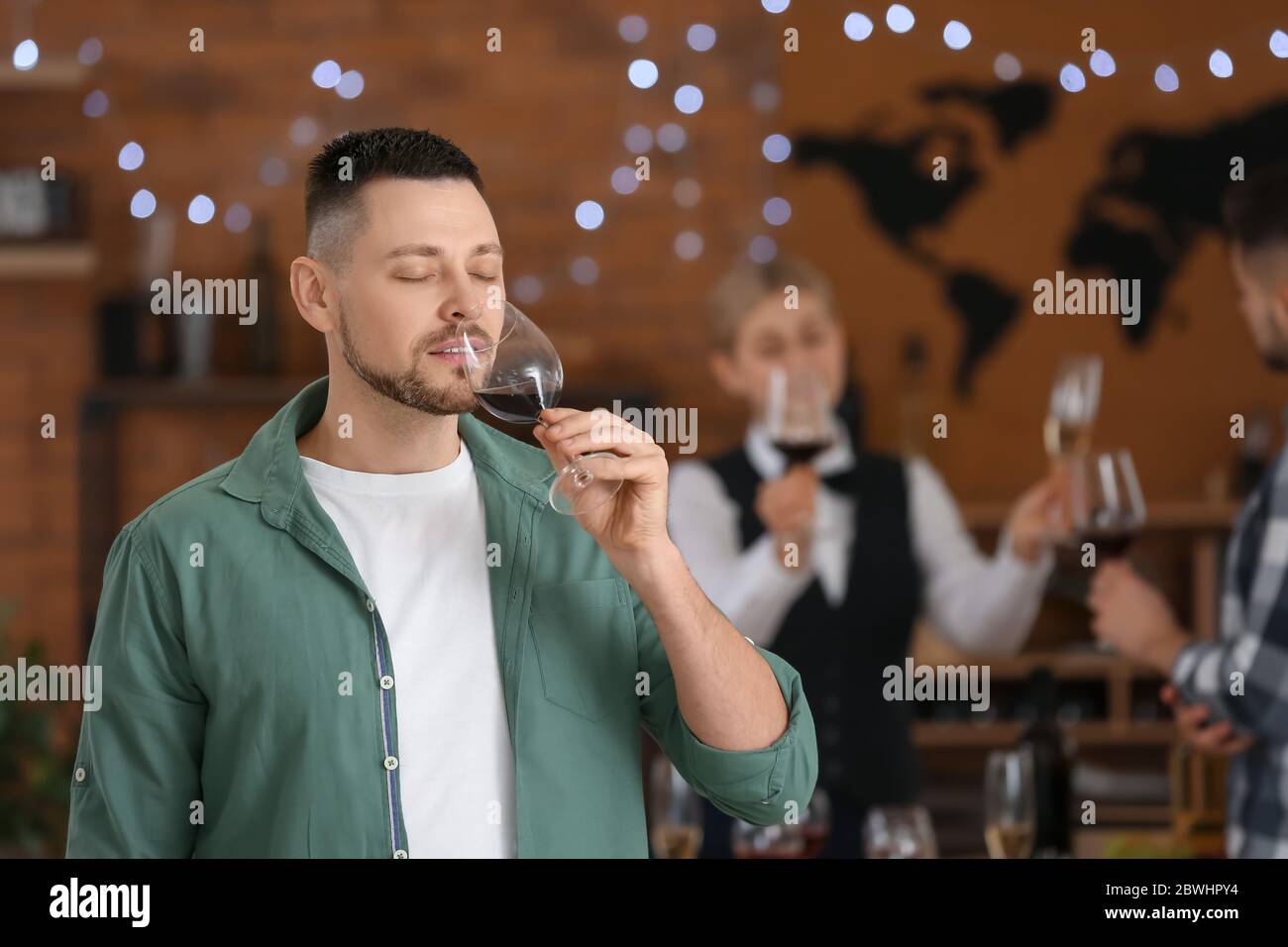 Man tasting wine at the restaurant Stock Photo - Alamy