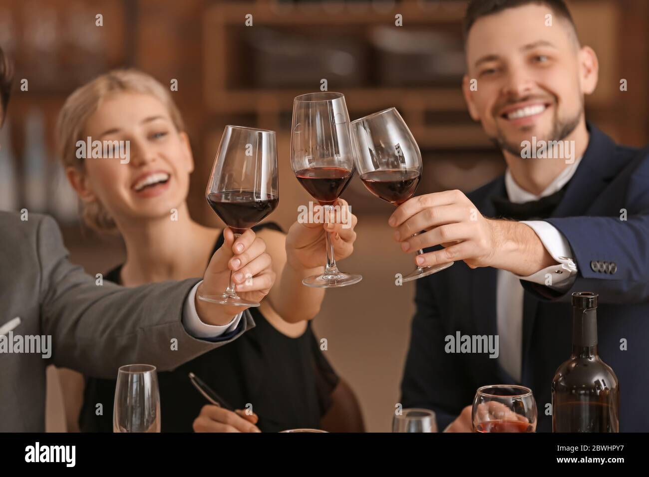 People tasting wine at the restaurant Stock Photo - Alamy