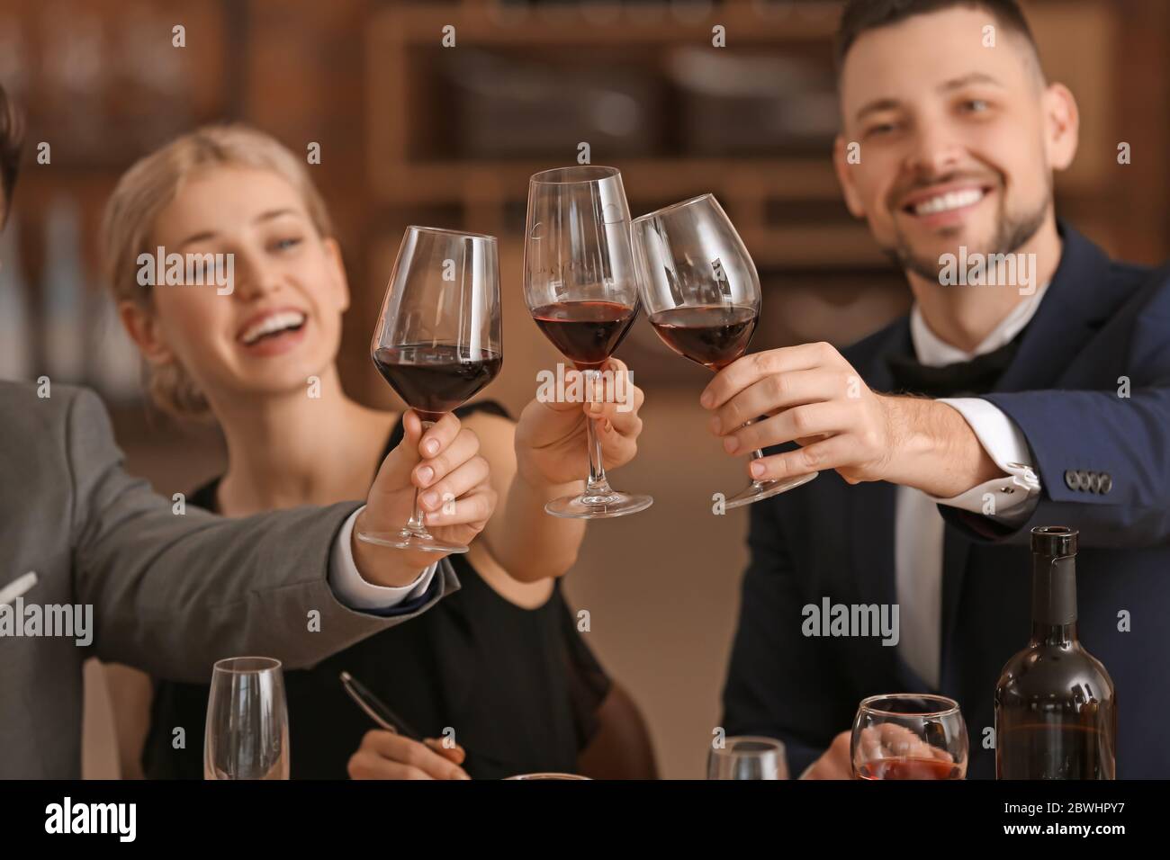 People tasting wine at the restaurant Stock Photo