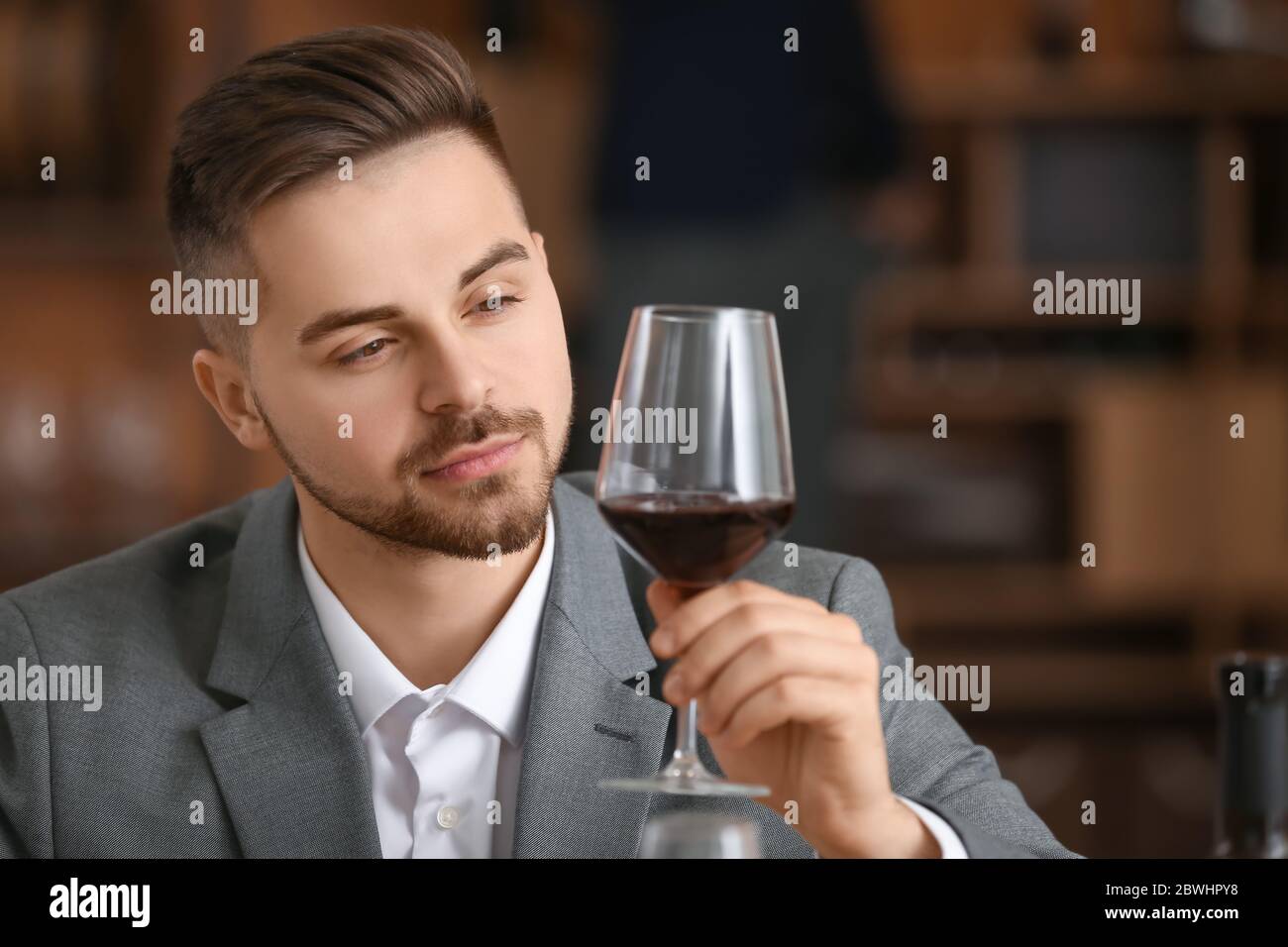 Man tasting wine at the restaurant Stock Photo - Alamy