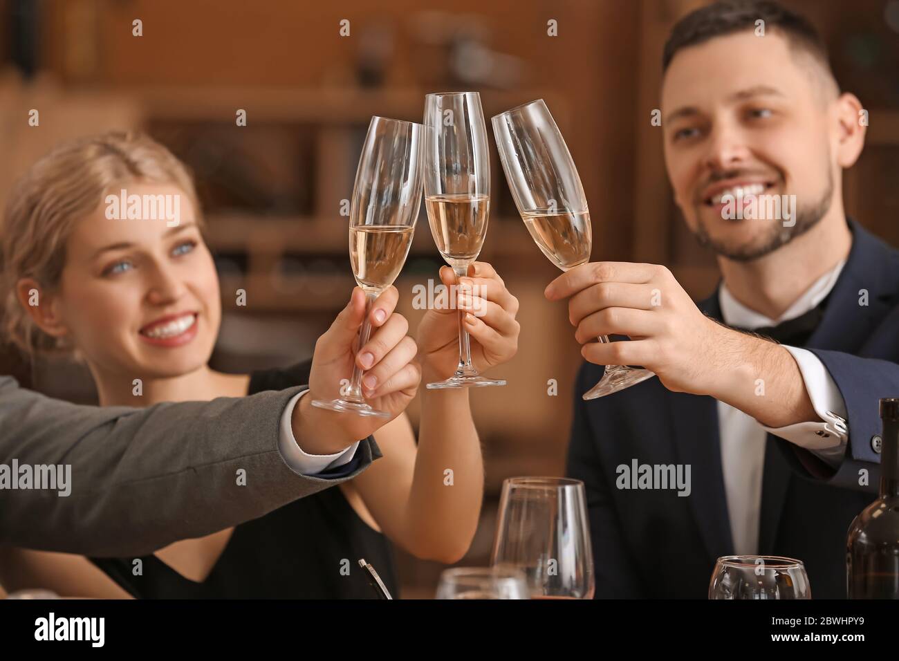 People tasting wine at the restaurant Stock Photo