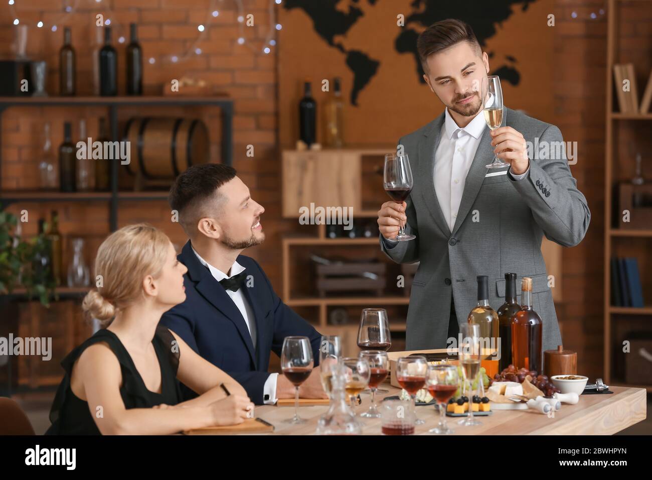 People tasting wine at the restaurant Stock Photo