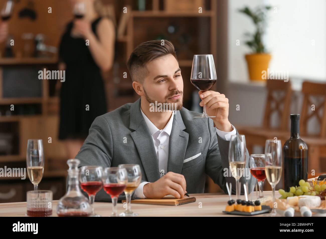 Man tasting wine at the restaurant Stock Photo - Alamy