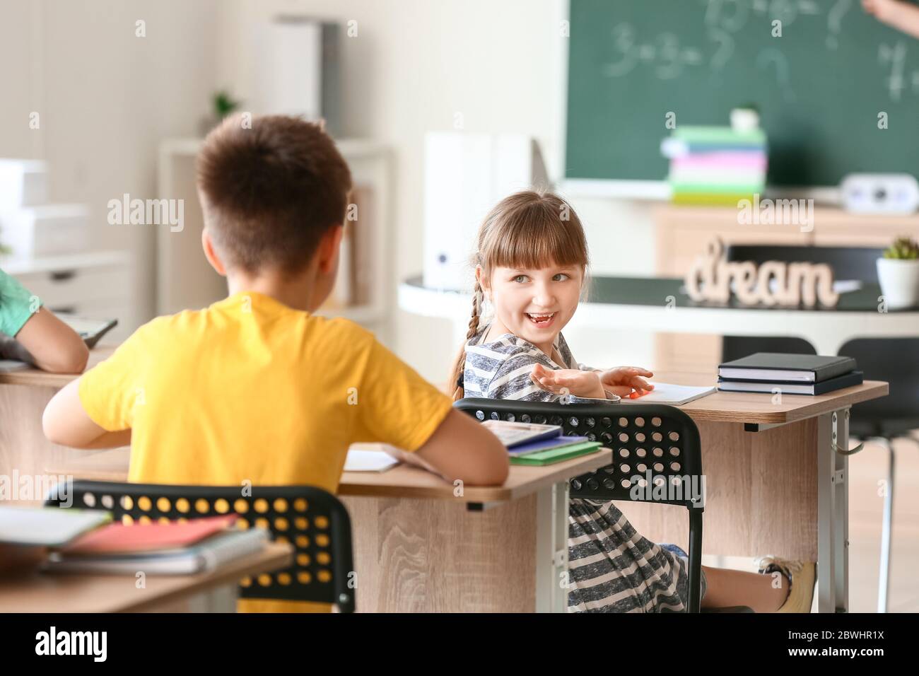 Kids During Math Children during math lesson in classroom Stock Photo - Alamy