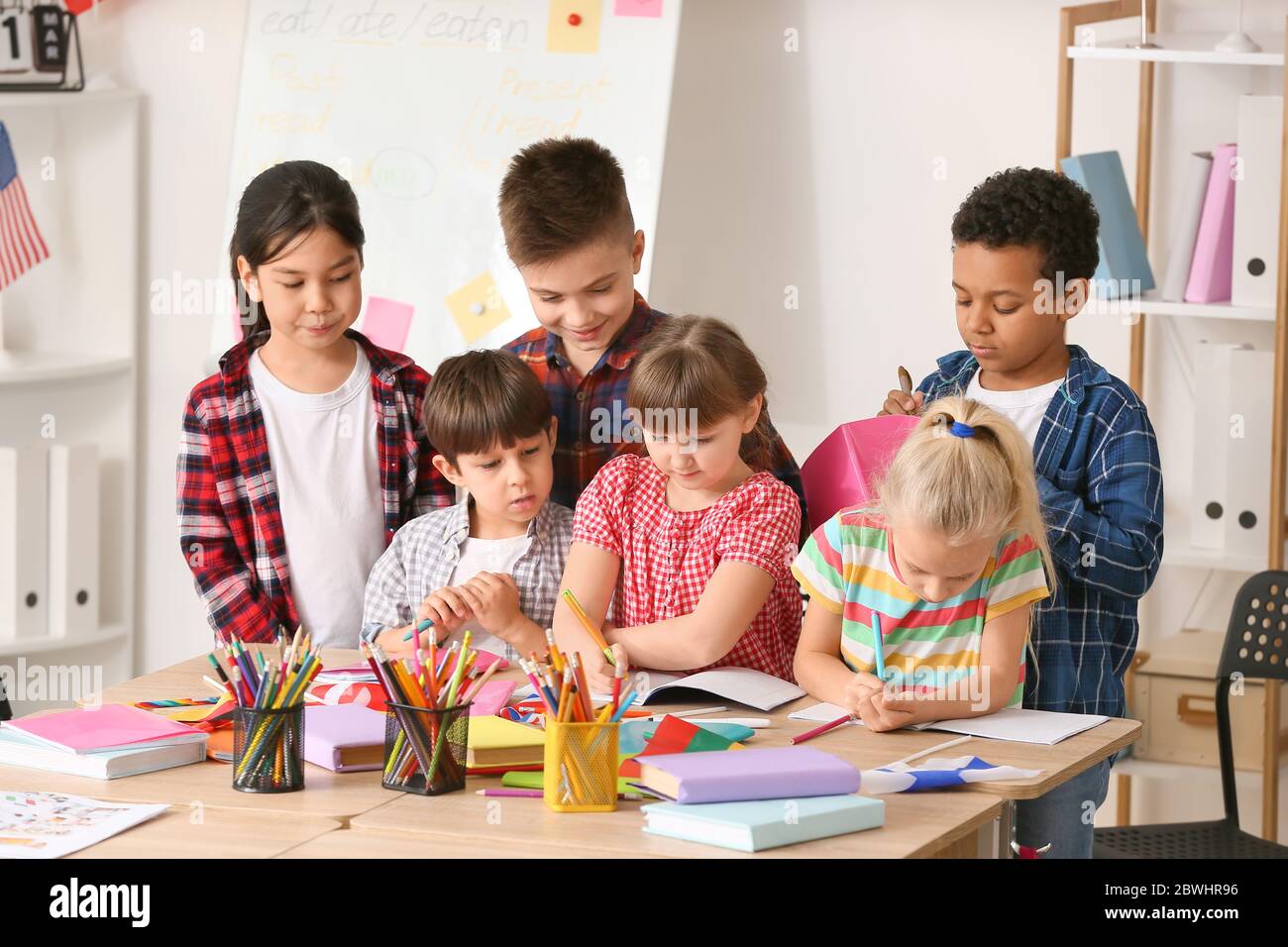 Little children during lesson at language school Stock Photo - Alamy