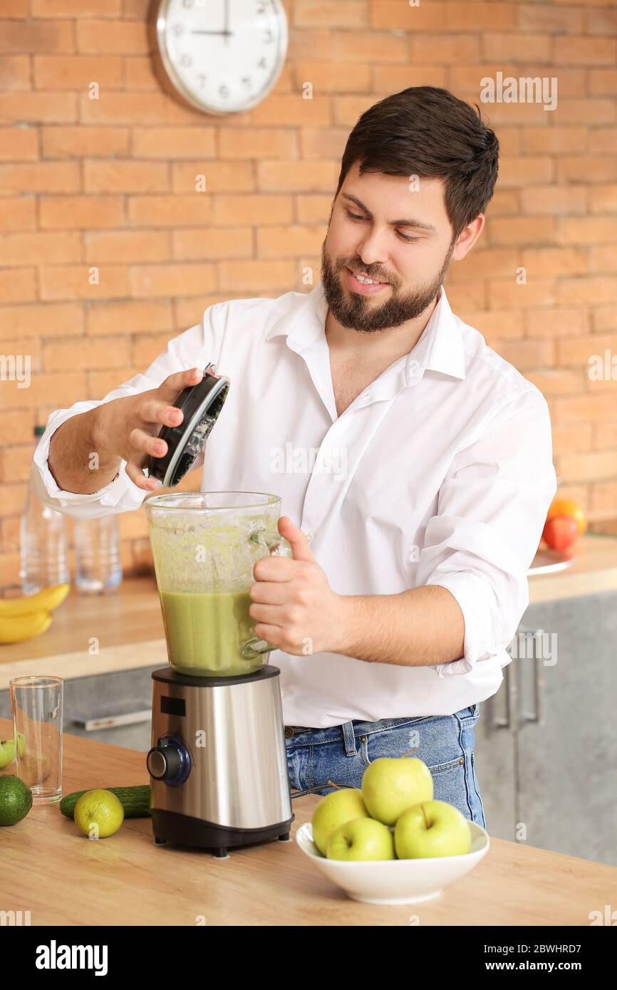 A Person Making Smoothie Using Blender · Free Stock Photo