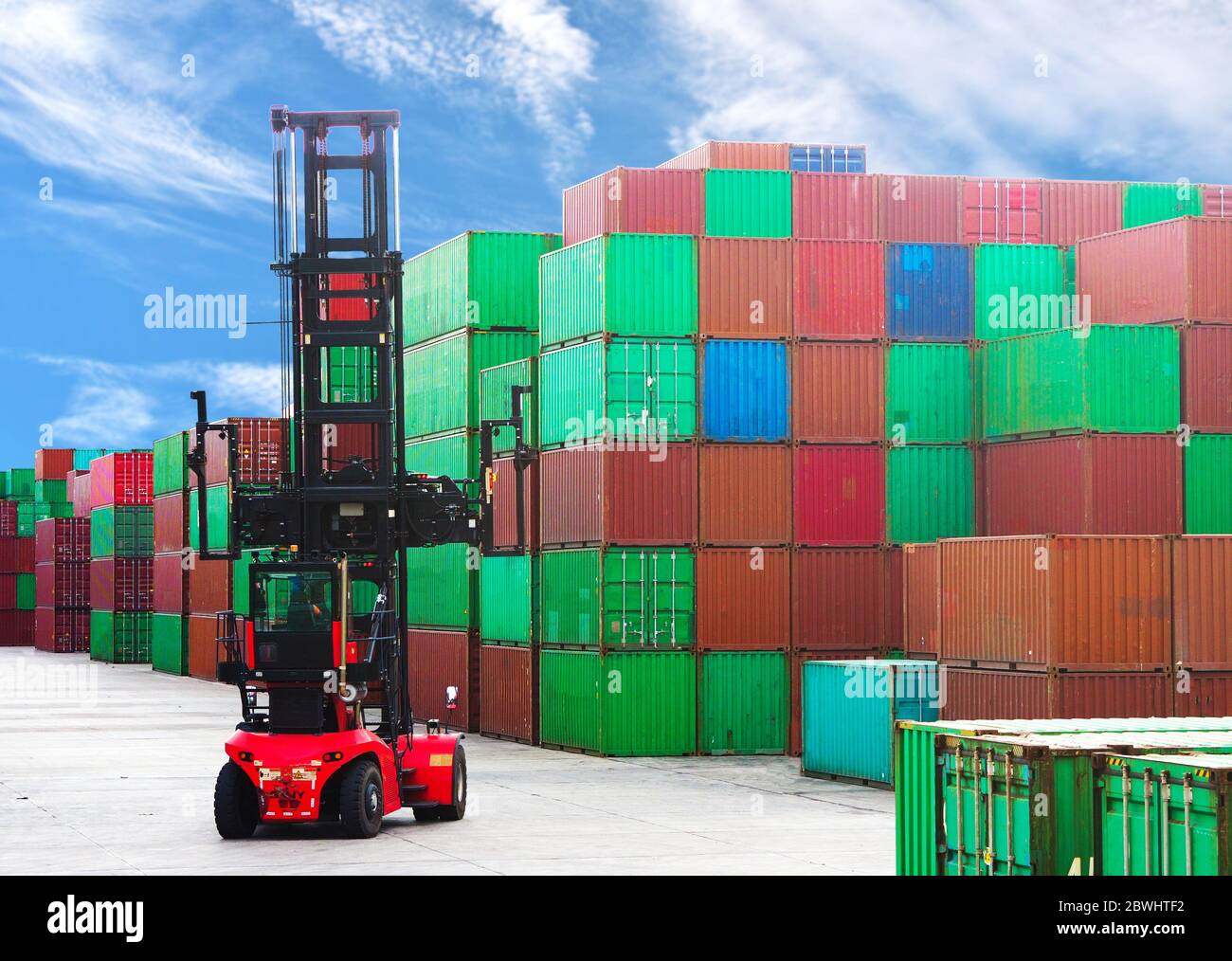 Container depot equipment, top lift inside yard with colorful