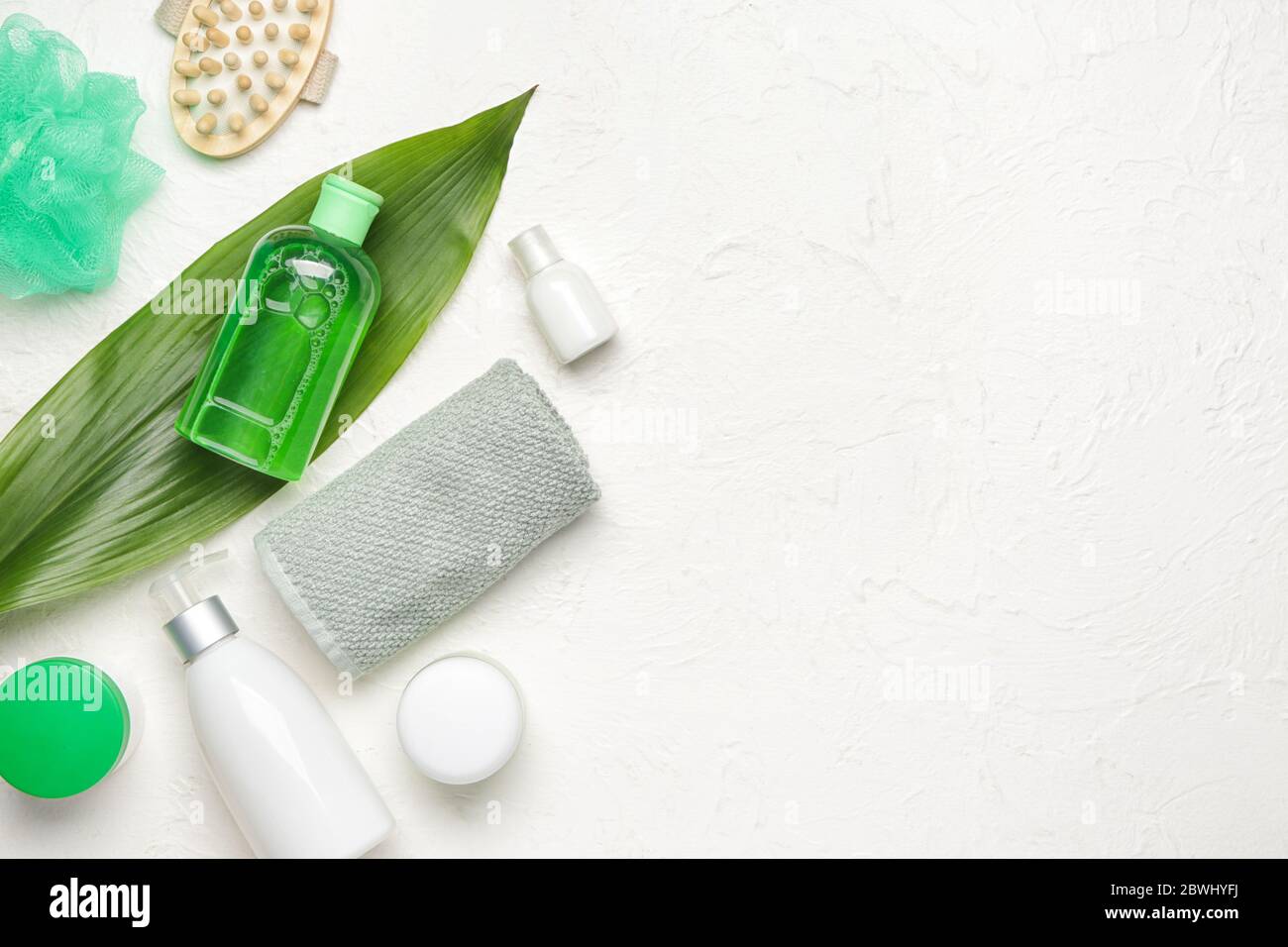 Shower gels with bath supplies on white background Stock Photo Alamy