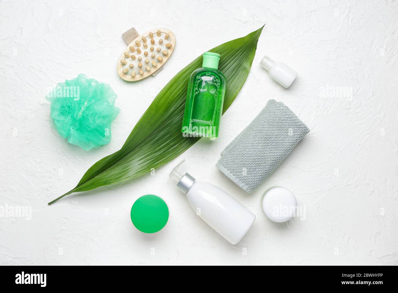 Shower gels with bath supplies on white background Stock Photo Alamy