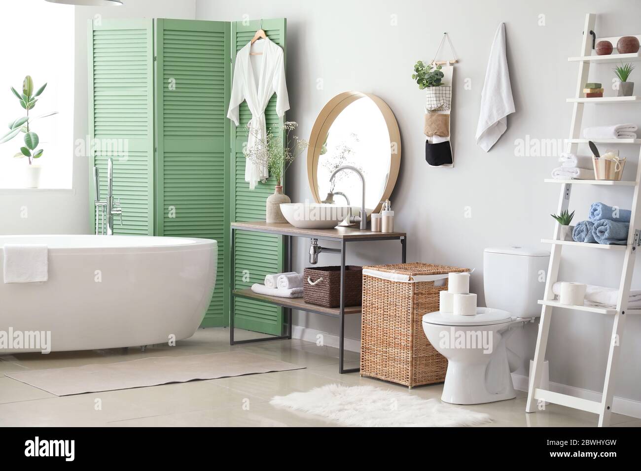 Stylish interior of modern bathroom with toilet bowl Stock Photo - Alamy