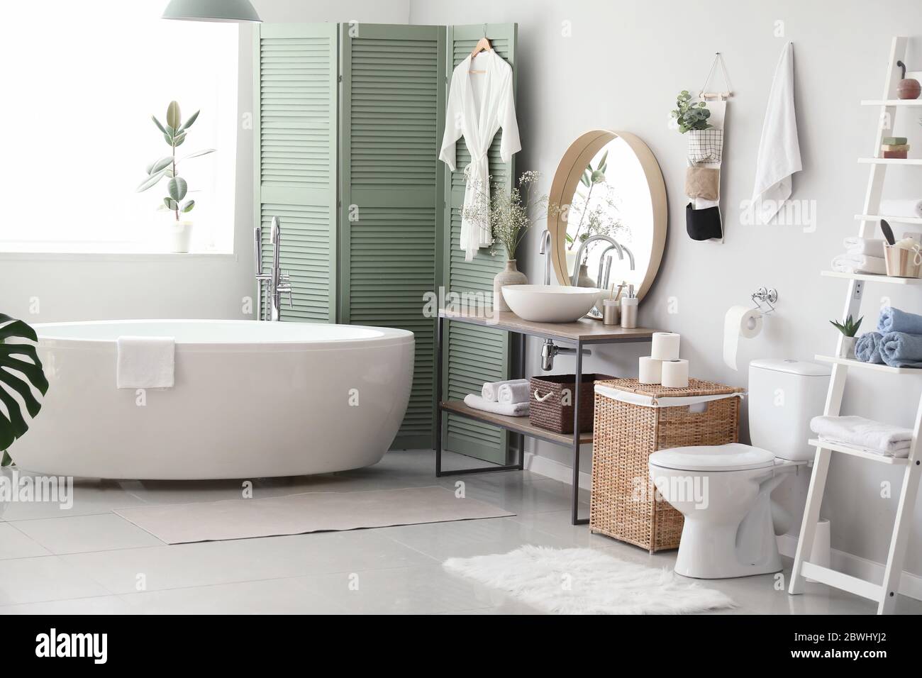 Stylish interior of modern bathroom with toilet bowl Stock Photo - Alamy