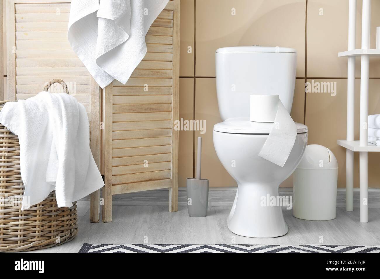 Stylish interior of modern bathroom with toilet bowl Stock Photo - Alamy