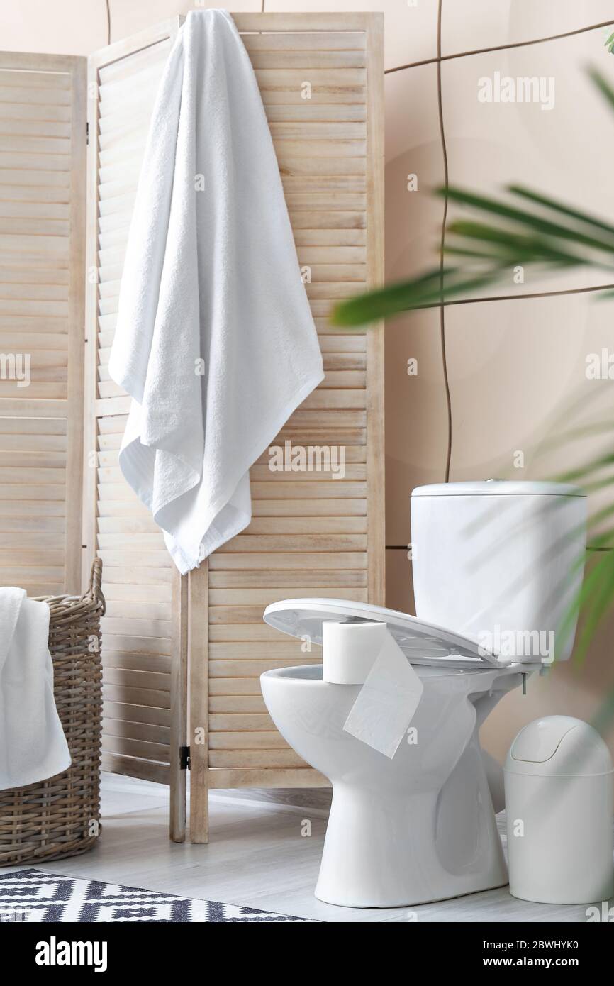 Stylish interior of modern bathroom with toilet bowl Stock Photo - Alamy