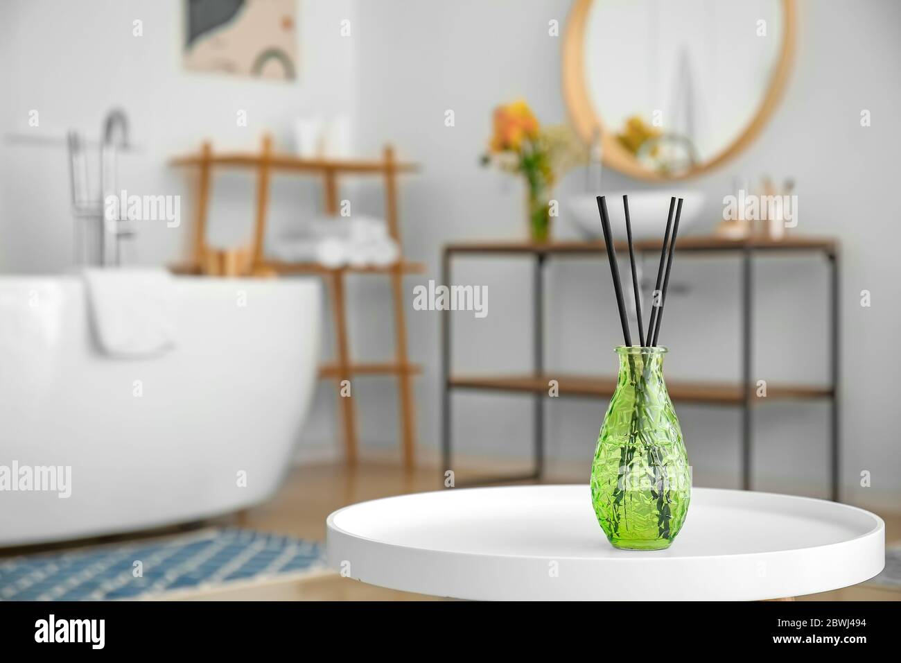 Reed diffuser in modern bathroom Stock Photo Alamy