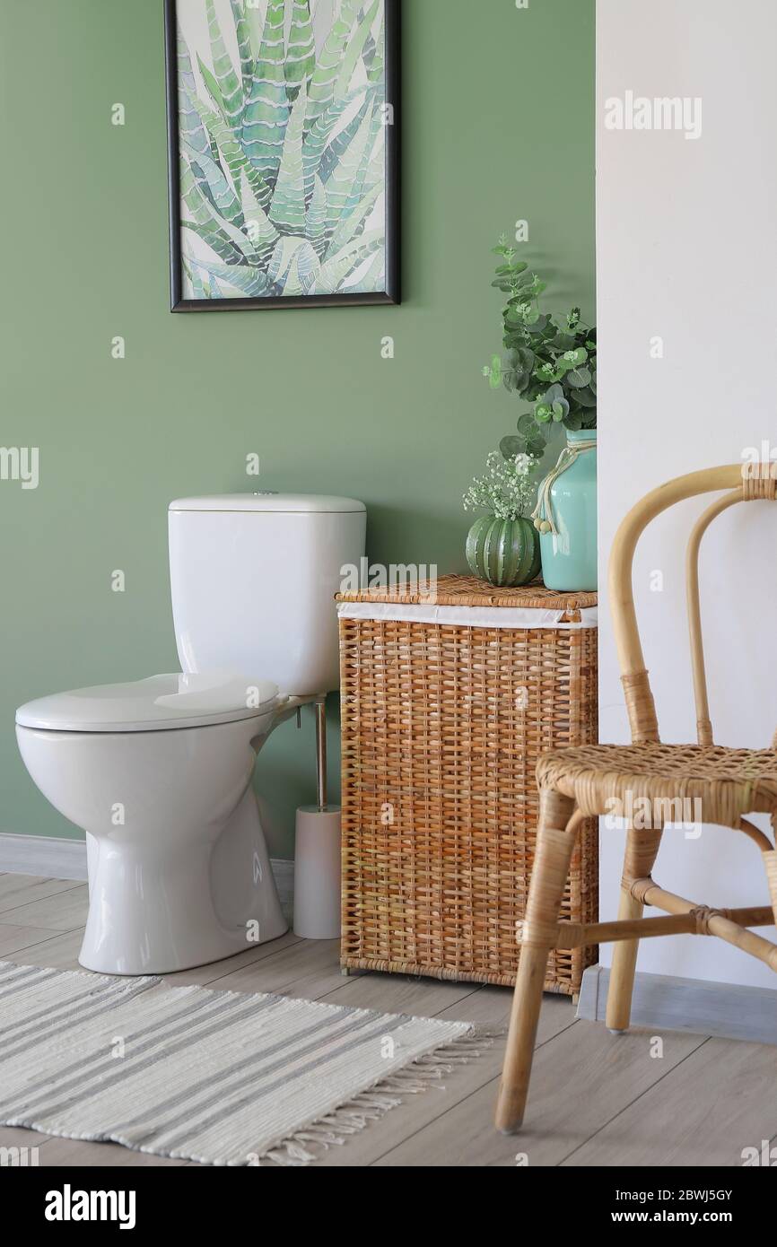 Interior of modern bathroom with floral decor Stock Photo