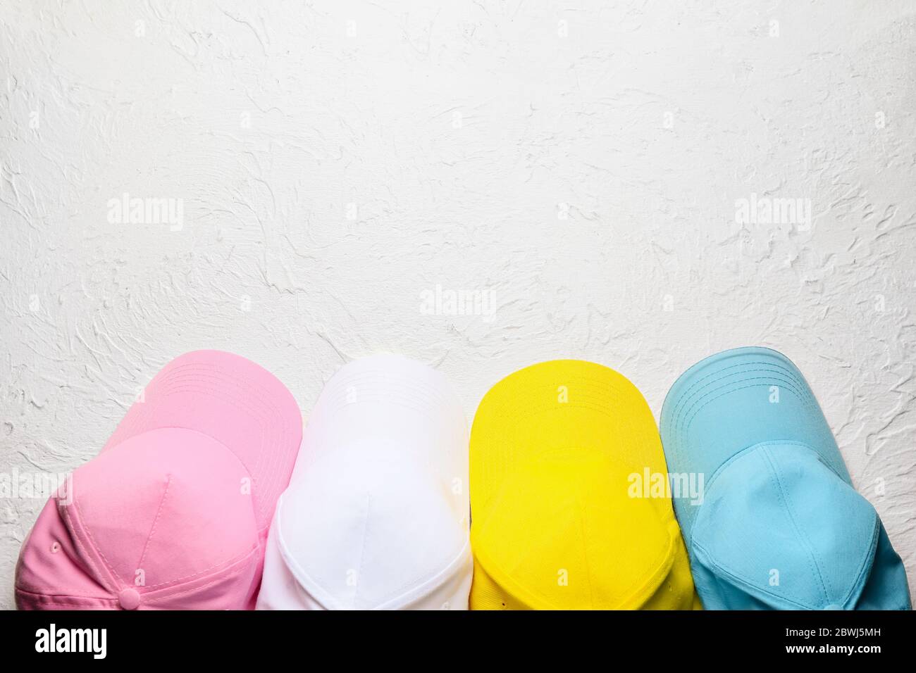 Blank caps on white background Stock Photo Alamy