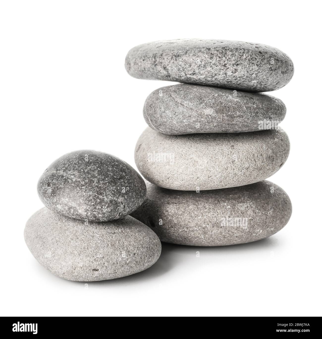 Spa stones on white background Stock Photo - Alamy