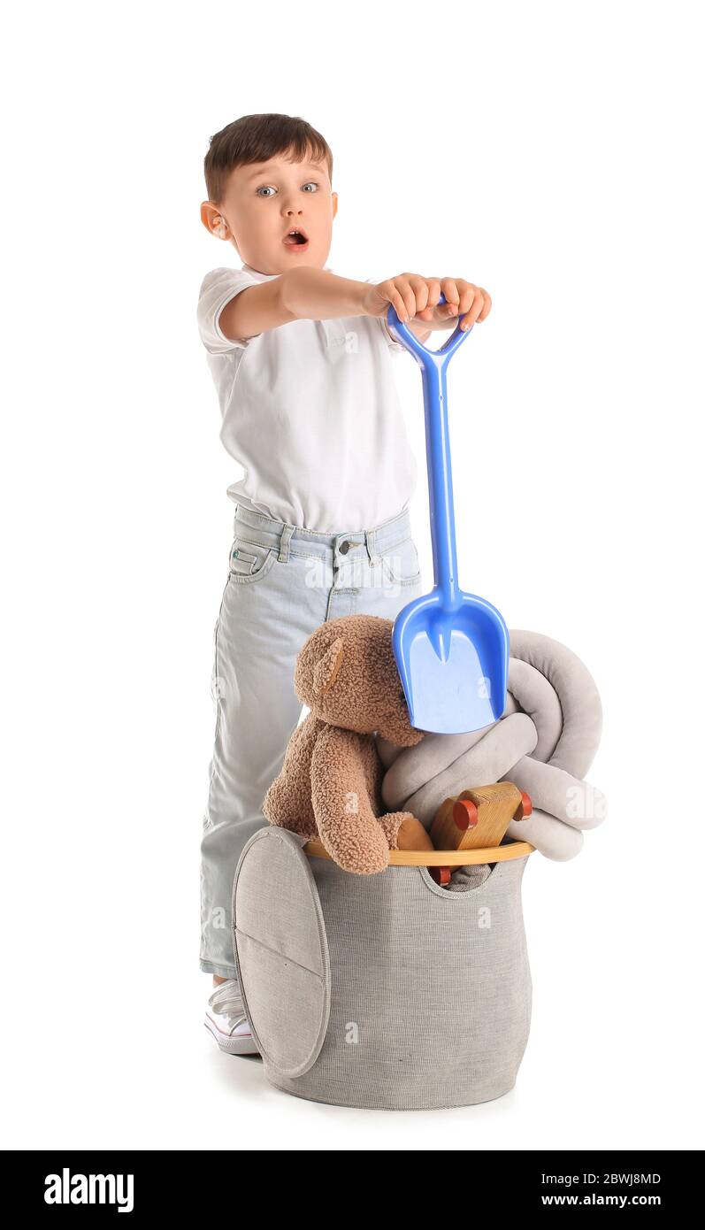 Little boy with toys on white background Stock Photo - Alamy